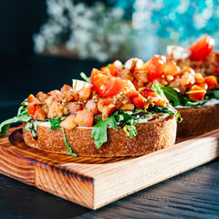 delicious bruschetta with vegetables on the board