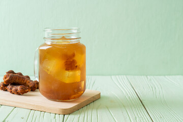 Delicious sweet drink tamarind juice and ice cube