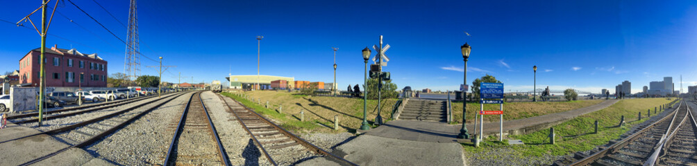 NEW ORLEANS, LA - FEBRUARY 2016: City skyline along the railway on a sunny winter day - Panoramic...