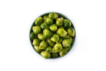 Set of brussel sprouts in a bowl isolated on white background.Top view