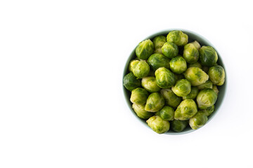 Set of brussel sprouts in a bowl isolated on white background.Top view.Copy space