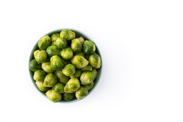 Set of brussel sprouts in a bowl isolated on white background.Top view.Copy space