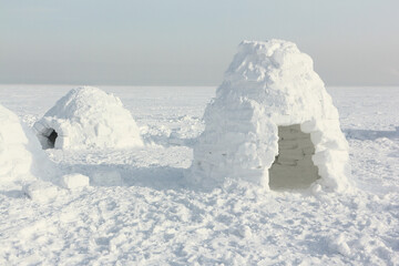 Igloo  standing on a snowy  reservoir in  winter, Novosibirsk, Russia
