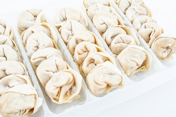 A box of wontons on white background