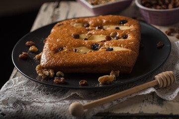 Closeup shot of a tasty biscuit with ingredients on the side