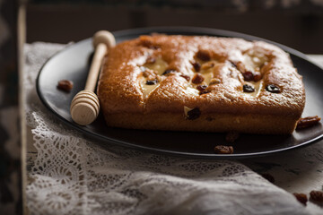 Closeup shot of a tasty biscuit with ingredients on the side