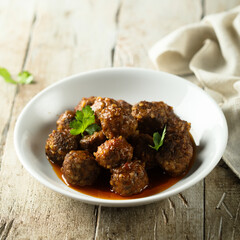 Traditional homemade meatballs with fresh basil