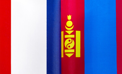 Naklejka premium fragments of the national flags of France and Mongolia close-up