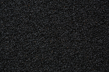 Black cumin seeds close up in studio