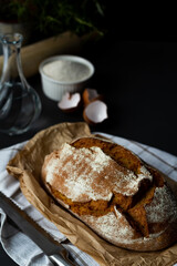 Healthy organic bread on the black towel