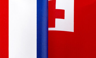 fragments of the national flags of France and the Kingdom of Tonga close-up