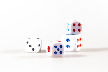 Multicolored gambling dices isolated on the white background