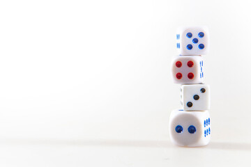 Multicolored gambling dices isolated on the white background