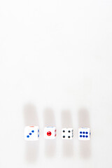 Multicolored gambling dices isolated on the white background