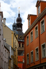 Naklejka premium View of the old clock tower in the center of Riga, Latvia