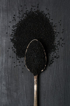 Black cumin seeds in spoon