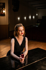 young woman with a glass of wine