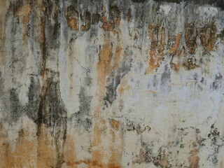 Old cement or concrete outdoor wall with stains and moldy for background.