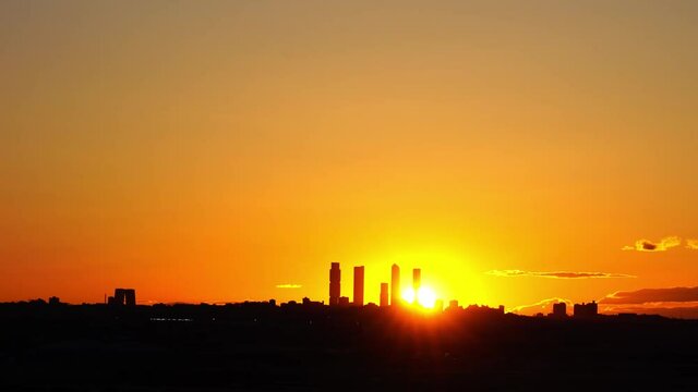 Madrid skyline sunset between towers in spring