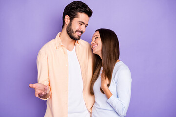 Photo of happy man and woman have goo time laugh joke wear blue pullover orange shirt isolated on violet color background