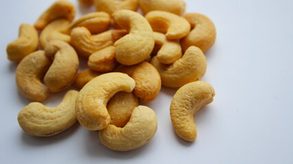 Roasted cashews without shell. Top view of cashew nut isolated on white background. Set or collection. 