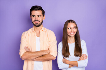 Fototapeta na wymiar Portrait of cheerful man lady folded arms look empty space toothy smile isolated on purple color background