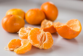 fresh tangerines on white background
