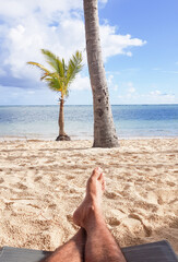 Punta Cana, in the Dominican Republic. December 2020. Woman relaxing on the beach in the Caribbean. 