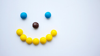 Colorful chocolate candy treat on white isolated background. ММ