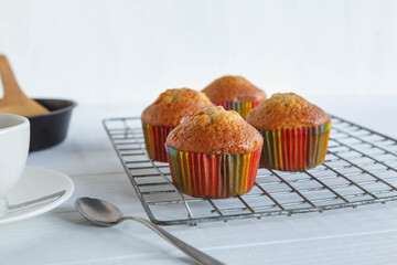 Home made cupcakes  and coffee cup on white table