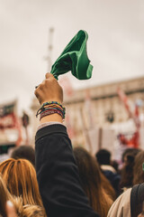 woman waving a handkerchief 