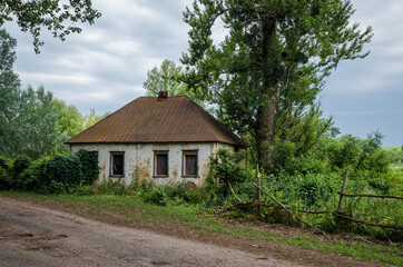 Old abandoned house on the outskirts of the village