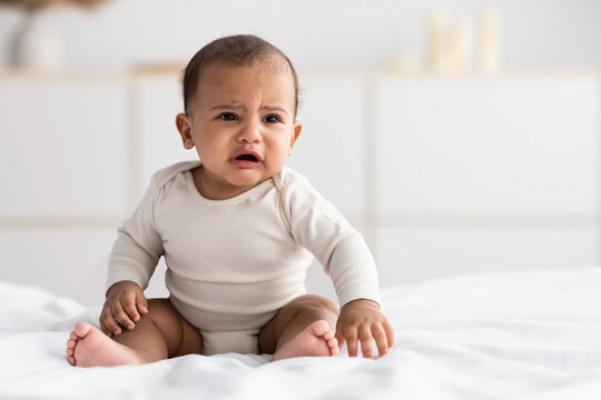 Portrait Of Sad Black Baby Crying Alone