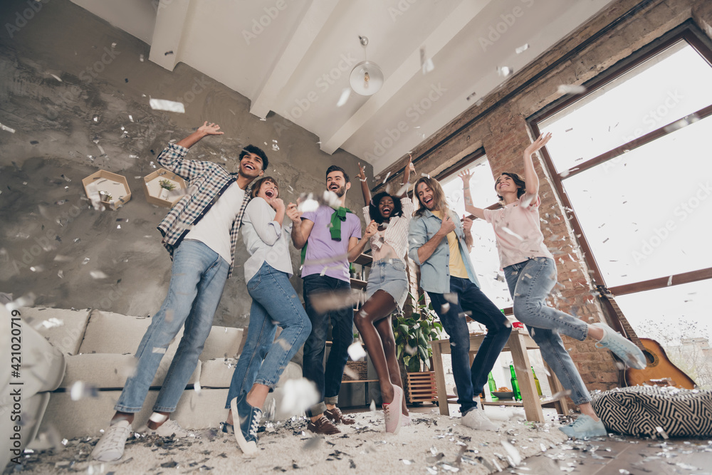 Poster full size low angle view photo of cheerful happy people party dance smile indoors inside house apart