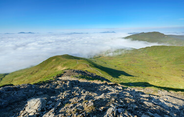 A cloud inversion covering Loch Tay with the mountain summit of Meall nan Tarmachan on the right...