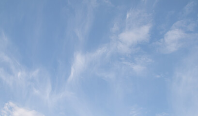 Blue sky with white clouds. Sky background.