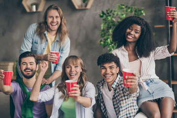 Photo of optimistic brunette blond hairdo guys ladies drink punch on party wear casual cloth at home