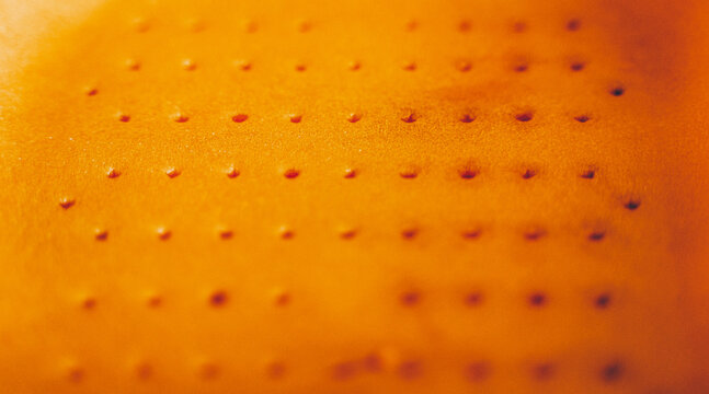 Orange Texture In The Holes In The Tray