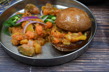 Indian pav bhaji- mixed spicy vegetables served with wholewheat bun