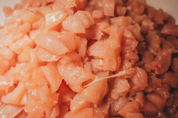 
Raw sliced ​​chicken pieces. To cook. Preparing for dinner. Cooking. A restaurant. Cafe. Workflow of cooking food
