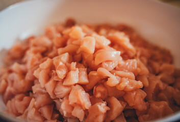 
Raw sliced ​​chicken pieces. To cook. Preparing for dinner. Cooking. A restaurant. Cafe. Workflow of cooking food