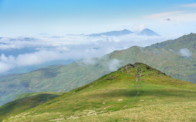 Distant views of the mountain summits of Ben More and Stob Binnein with Meall Nan Tarmachan off to...