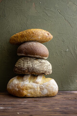 Fototapeta na wymiar assortment of bread on wooden table