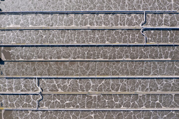 Water treatment tank in modern wastewater factory, cleaning and filtration before draining to river	