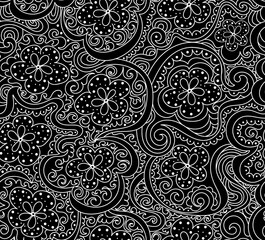 Beautiful vector seamless pattern with handwritten flowers with ornamental figured curling lines