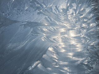 Beautiful frosty patterns on the window. Natural textures.
