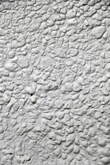 textured stucco background with scratches. uneven plaster backdrop