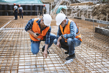 Managers, engineers discuss the further process of work on the construction site