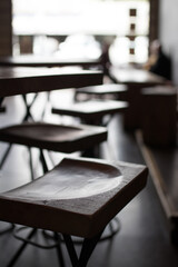 Tall tables and timber stools in a bar cafe