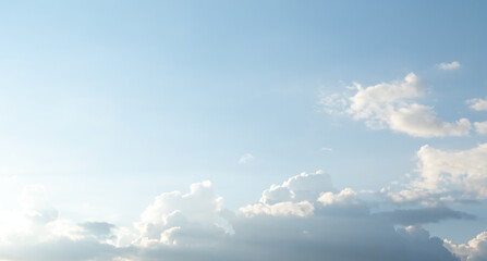 White clouds against the blue sky.